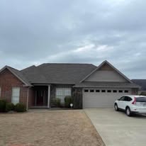 Brick ranch home with new asphalt shingle roof
