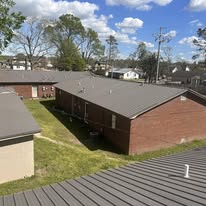 Low-slope roof on a multi-family property
