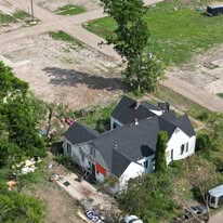 Aerial view of storm-affected neighborhood