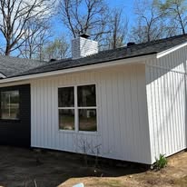 Close-up of new roof and chimney flashing on a home