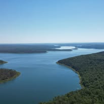 Aerial view of an Arkansas lake and forest